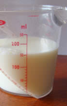 150ml of milk in cup
